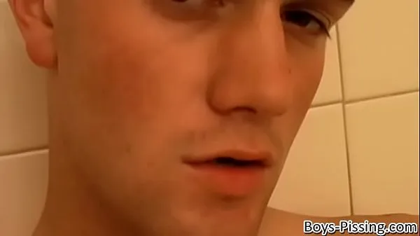 HD Horny young man splashing piss and cum in the shower محرك الأفلام
