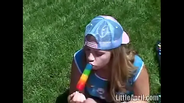 HD Cute Little April Outdoors Sucking A Popsicle drive Movies